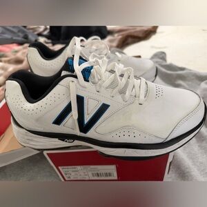New Balance Men's White and Black Sneakers with Blue Accents
